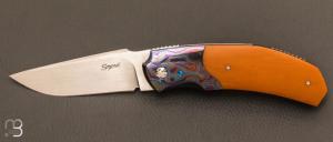    Couteau " Rocket " custom de Stéphane Sagric - Micarta Westinghouse et ZircuTi et Zirconium