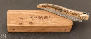    Couteau Laguiole en Aubrac 12 cm double platines manche ivoire de mammouth et lame damas inoxydable